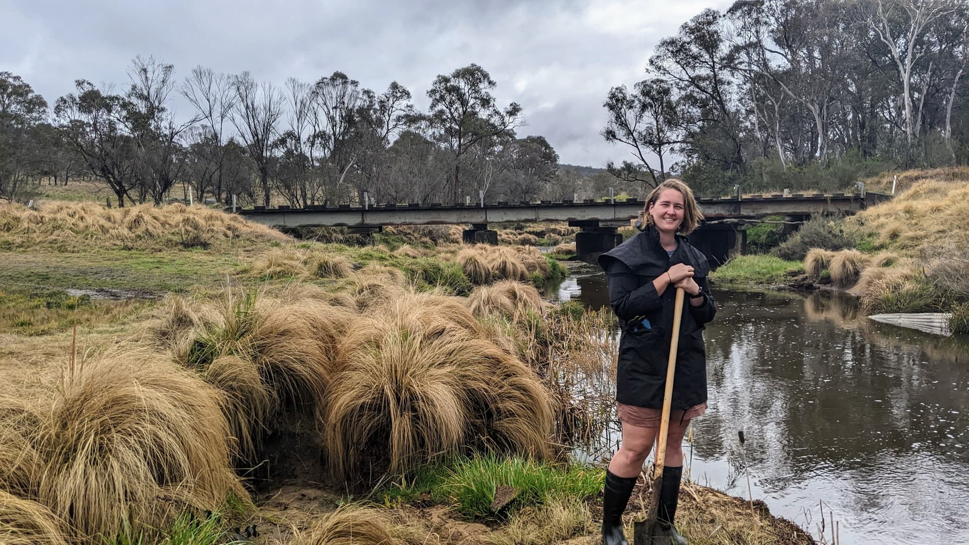 Shannon Trevisiol, founder and landscape designer at Attn: Landscapes, on site by a creek